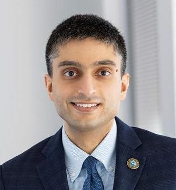 Professional man in formal attire.